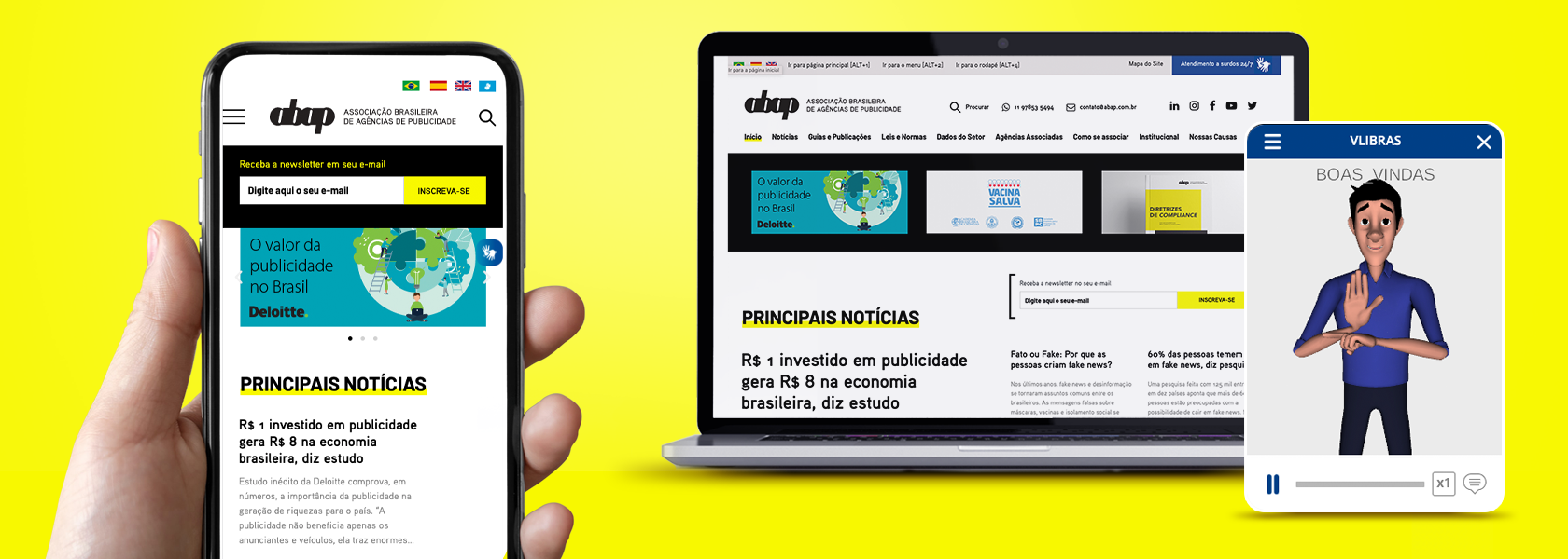 Mão segurando um smartphone e um tablet com um site visível, ilustrando a conectividade e o uso de dispositivos móveis e as ferramentas de acessibilidade